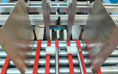 Encoladora de rompecabezas de alimentación única