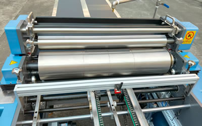 Encoladora de rompecabezas de alimentación única